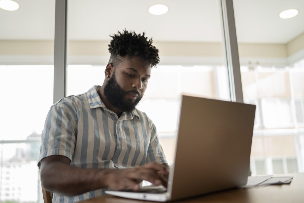 Student on laptop at home